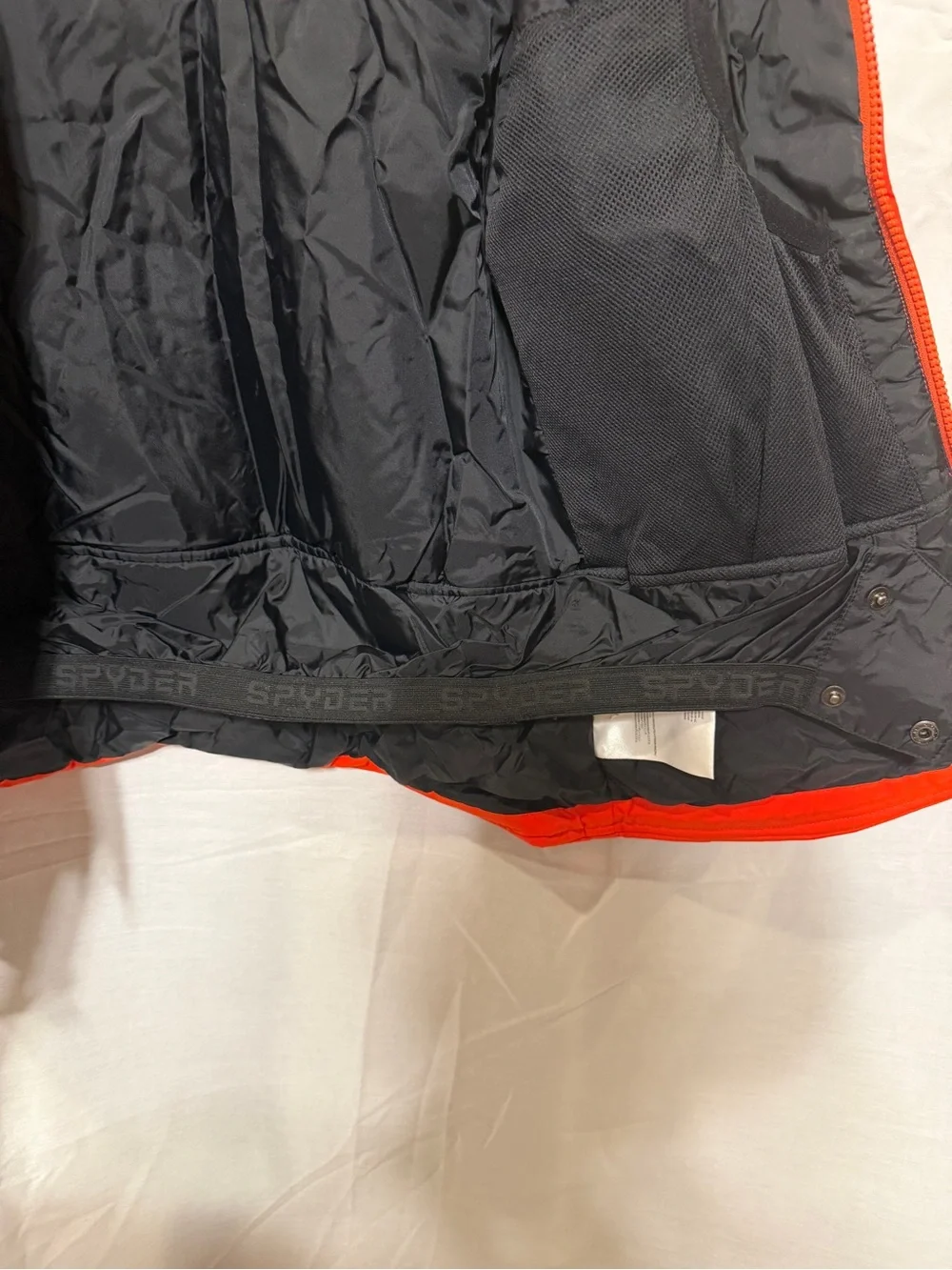 Spyder Kids Orange-Red Ski Jacket with Black & White Panels